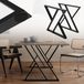 Pieds de table forme X 69x72 cm acier noir 2 pièces