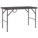 Prolenta Maison Exclusive Table de jardin pliante, couleur marron, dimensions 120x60x74 cm, en HDPE imitation rotin