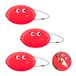 Fisura – Ovale rubberen portemonnee “Ojos” roze. Retro portemonneetje met ketting, een unisex zakmodel met karakter. 3 stuks.