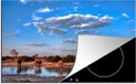 Merkloos KitchenYeah® Inductie beschermer 77x51 cm - Olifanten drinken bij een rivier - Inductiebeschermer