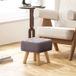 Repose-pieds avec rembourrage, aspect lin, pieds en bois, jusqu'à 110 kg de charge, gris
