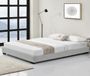 Corium Houten bed Laag kunstleer met bedbodem 180x200 cm wit