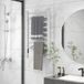 Chauffe-serviettes mural ou sur pied 150W, 8 barres, minuterie 2-4h, 53x35x90 cm, acier inoxydable argenté.