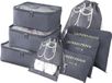 Unyqoos® Organisateur de valise, set de voyage 8 pièces, sacs de rangement étanches, 2 sacs à chaussures (M/L), 3 sacs de rangement, 3 sacs (S/M/L), gris