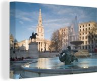 OneMillionCanvasses Canvas schilderij 150x100 cm - Sierlijke fontein op Trafalgar Square - Multicolor