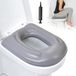Coussin de toilette gonflable avec bouton de fixation et ventouses - Étanche et réglable