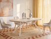 Vente-unique Table à manger extensible pour 4 à 8 personnes en MDF et Acier - effet travertin beige et Blanc KOMONI