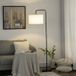 Lampadaire blanc acier abat-jour en tissu avec interrupteur au pied