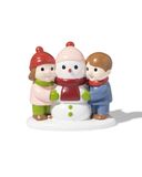 HEMA Enfants Avec Bonhomme De Neige Devant Le Village De Noël