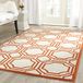Safavieh Ferrat Ferrat Tapijt voor binnen en buiten AMT411 91 x 152 cm ivoor/oranje
