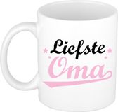 Bellatio Decorations Cadeau koffie/thee mok voor oma - roze - de liefste - 300 ml
