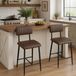 Tabourets de bar - Set de 2 - Hauteur pour bars - Tissus d'ameublement en similicuir - Cadre en métal - Dossier ergonomique - Repose-pieds intégré - Marron
