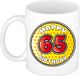 Bellatio Decorations Verjaardag cadeau mok - 65 jaar - geel - sterretjes - 300 ml - keramiek
