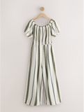 Next - Dames - Petite jumpsuit met blote schouder en wijde pijpen - Petite - Crème