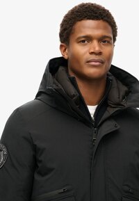 Superdry City Padded Bomber Jas Heren - Maat M - Zwart