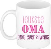 Bellatio Decorations Cadeau koffie/thee mok voor Oma - roze - de leukste Oma - keramiek - 300 ml