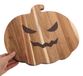 Planchette de service en bois en forme de citrouille avec poignée