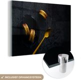 MuchoWow Glasschilderij Macarons - 150x100 cm - Goud Zwart
