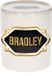 Bellatio Decorations Shoppartners Bv Spaarpot met voornaam Bradley - wit - met goud/zwart embleem - 8 x 9 cm - keramiek - met afsluitdop - cadeau verjaardag