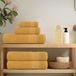 VidaXL 8-delige handdoekenset frogn 360 g/m² goud