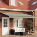 Maison Exclusive - Pare-soleil électrique avec panneaux solaires, 5 x 3 mètres, rayé vert-blanc