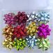 Rosettes autocollantes, 5 cm, couleurs diverses, 24 pièces par paquet.