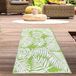 Tapis d'extérieur avec motif feuille de palmier, couleur vert, dimensions : 90 x 150 cm