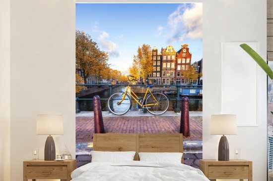 Nr1Wallpaper Behang - Fotobehang Fiets voor de gracht met uitzicht op Amsterdamse architectuur - Breedte 225 cm x hoogte 350 cm