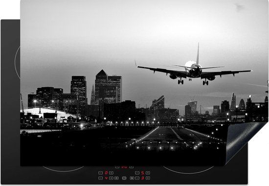 KitchenYeah® Inductie beschermer 77x51 cm - Vliegtuig land in London - zwart wit - Inductiebeschermer voor inductiekookplaat