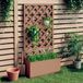 Maison Exclusive - Jardinière avec treillis pour plantes grimpantes, couleur marron, dimensions 65x33x135 cm, matériau composite bois-plastique (WPC)