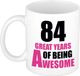 Bellatio Decorations Verjaardag 84 jaar Koffiemok Cadeau - Great years of being awesome - wit/roze - beker - Jubileum - voor dames - vrouwen