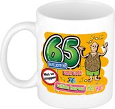 Bellatio Decorations cadeau mok 65 jaar - daar gaan je wilde haren - keramiek - 300 ml