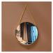 Miroir mural rond avec cadre doré pour salle de bain
