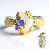 Cavill - Elegante Zilveren Ring 925 met Ovaal Parelmoer 14x10 mm en 0,504 ct Tanzaniet - Ovaal Design met Gele Bloemen - Damesring met Certificaat