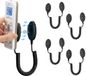 Unyqoos® set de 4 pièces de supports magnétiques pour télécommandes et petits objets, noir, auto-adhésif, avec mécanisme à ressort