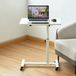 Bureau réglable pour ordinateur portable avec roulettes pivotantes à 360°, noir