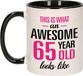 Bellatio Decorations Verjaardag cadeau mok 65 jaar - zwart/roze - grappige tekst - 300 ml - keramiek
