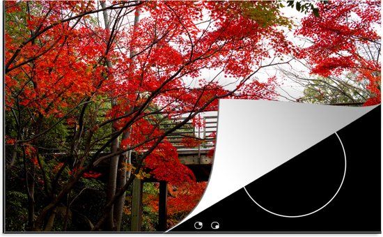 KitchenYeah® Inductie beschermer 77x51 cm - Brug door een park met Japanse esdoorns - Inductie kookplaat accessoire