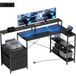 Bureau Gamer en L avec éclairage LED et prises, support double écran, dimensions 165x80x91,5 cm, design bois noir