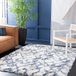 SAFAVIEH Hagle Horizon Shag Collection, korte pool, voor woonkamer, eetkamer, slaapkamer, ivoor en blauw, 91 x 152 cm