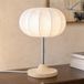 Lampe de table Nola Elovie, naturel/chrome, tissu/travertin, 35 cm