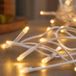 HELLUM LED mini lichtketting binnen, 1,35 m lichtlengte 10 LED lichtketting binnen, klassieke warm witte met stekker, stroomkabel wit, stekker 1,5 m, 579109