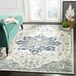 SAFAVIEH Modern chic tapijt voor woonkamer, eetkamer, slaapkamer - Madison Collection, laagpolig, in ivoor en marineblauw, 183 x 274 cm