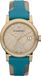 Burberry The City dameshorloge, doré avec des accents turquoise