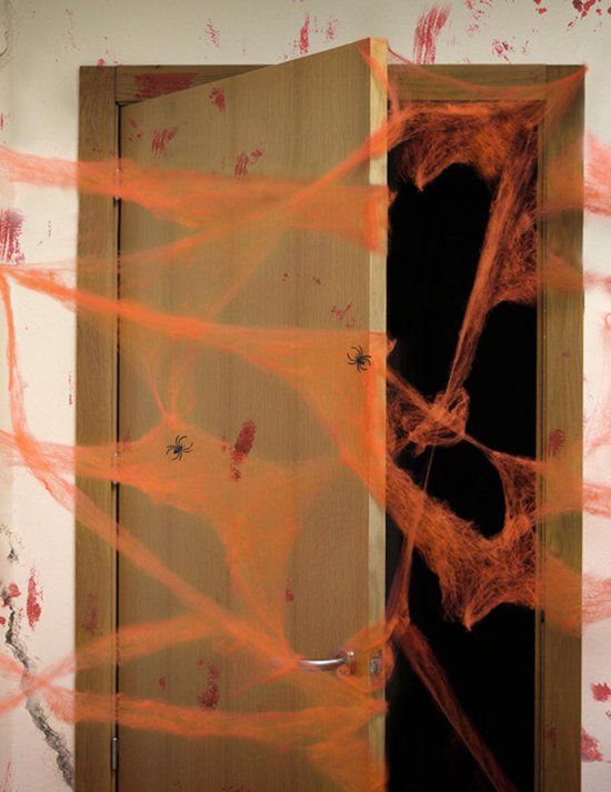 ATOSA - Oranje spinnenweb met spinnen