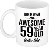 Bellatio Decorations Shoppartners Bv This is what an awesome 59 year old looks like - cadeau koffiemok - beker - 300 ml - verjaardag 59 jaar