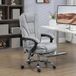 Fauteuil de bureau relaxant avec massage et chauffage, hauteur réglable, dossier inclinable, télécommande, repose-pieds escamotable, teinte grise