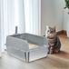 Merkloos Grote, gedeeltelijk open kattenbak van roestvrij staal met schep