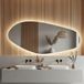 Lumoire® Miroir avec éclairage - 140 CM Organique - Miroir de salle de bain - Asymétrique - Commande par capteur