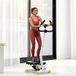 Stepper pliable avec guidon, pédales antidérapantes et écran LCD, cadre acier et ABS, dimensions 55x44x108 cm, coloris blanc, noir et vert.